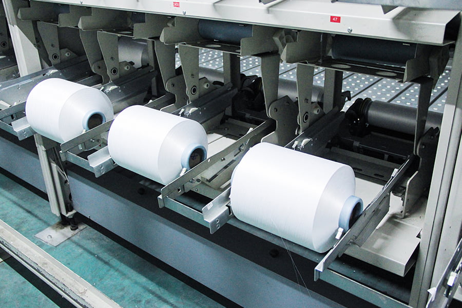 Ako ovplyvňujú možnosti denier a počet filamentov výkon a použitie priadze FDY?